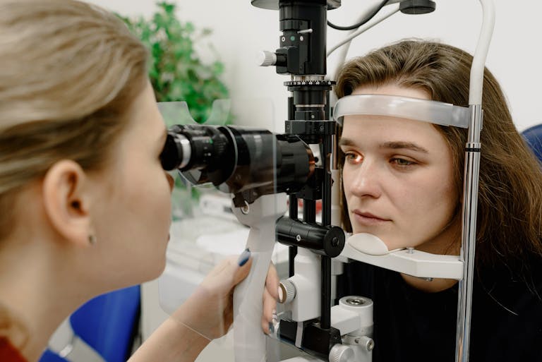 Woman undergoing eye exam for vision loss linked to Ozempic Lawsuit side effects