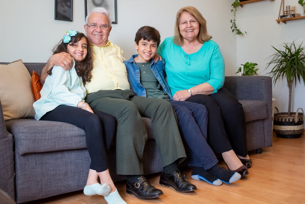 Navy veteran with grandchildren and family showing support after mesothelioma diagnosis
